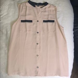 Light pink sleeveless blouse